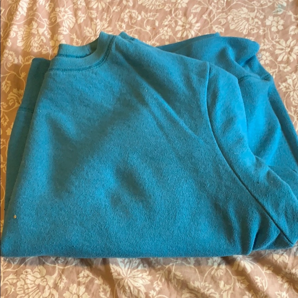 light blue sweater